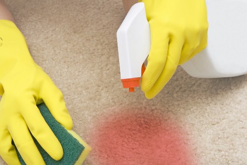 Office cleaning team working in a Clapham workplace reception area